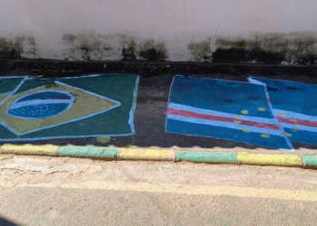 Moradores de Cabo Verde, em Minas Gerais, pintam rua e se reúnem para torcer por Cabo Verde, da África